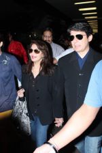 Madhuri dixit snapped with husband in Mumbai Airport on 6th April 2012 (29).jpg